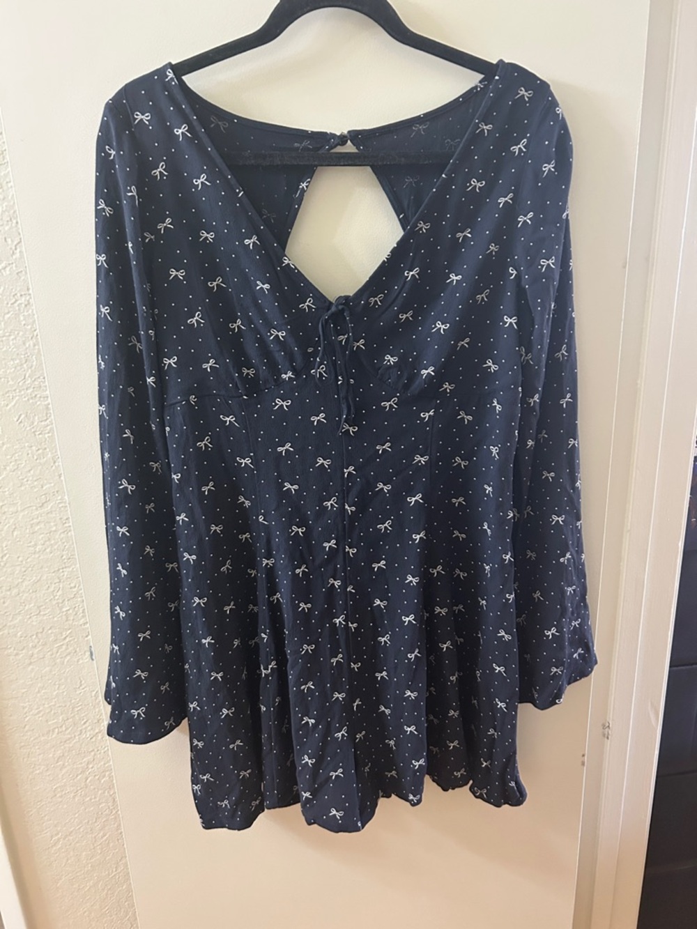 American Eagle Outfitters Navy Bow-Print V-Neck Romper